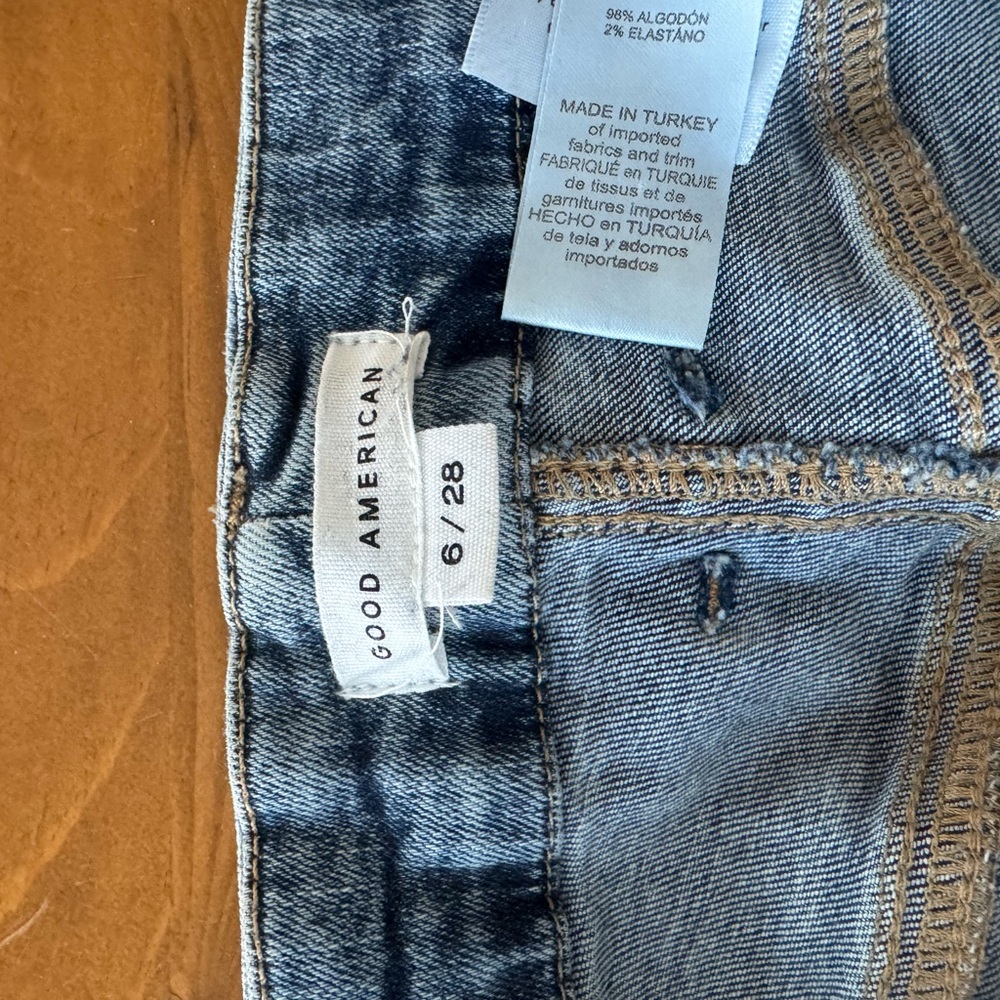 Good American women’s raw hem flare Denim Jeans